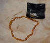 Naturbernstein Baby-Kinderkette - cognac Oliven / Narayana Verlag